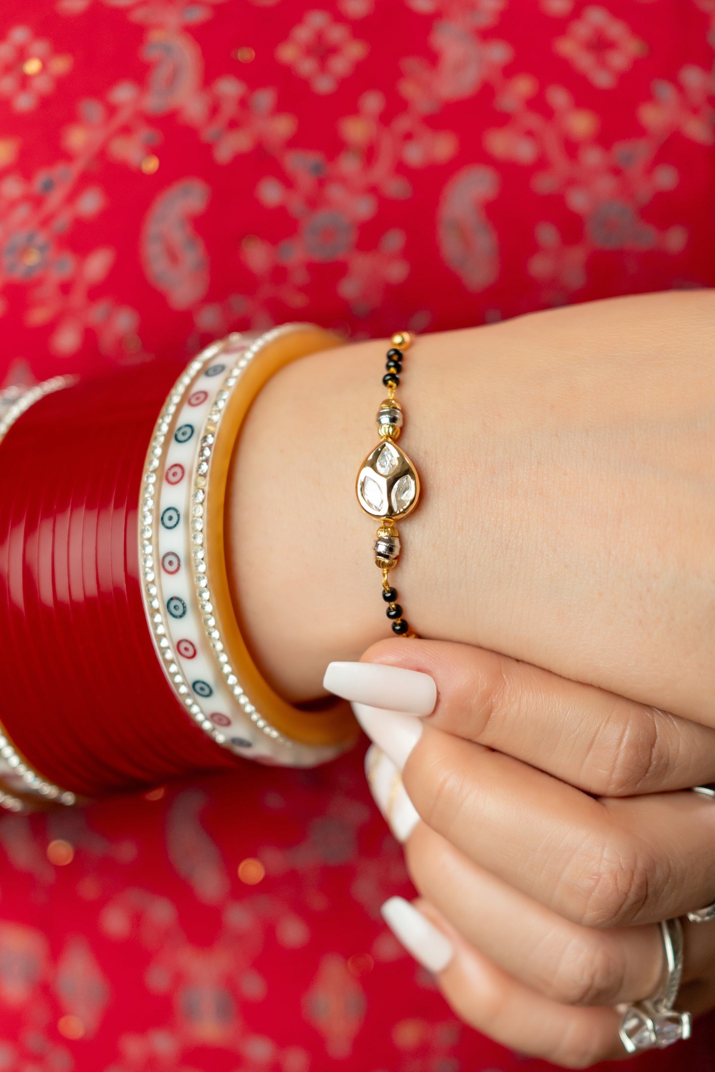 Gold Plated Anti Tarnish Mangalsutra Bracelet (Tri Leave Pattern)